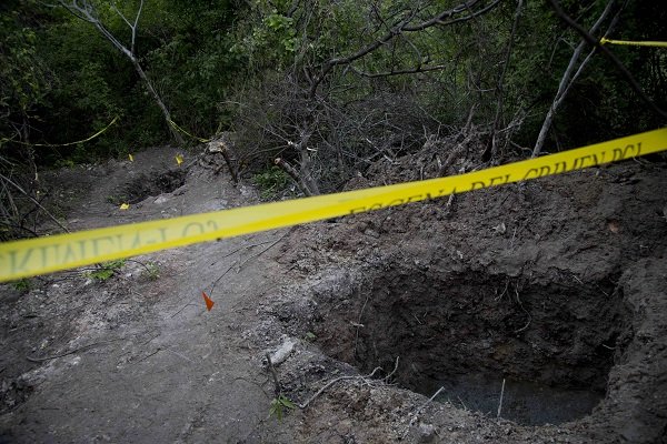 ¡Ejecutan a mujer que integraba un comité de búsqueda de cuerpos en fosas de Iguala!